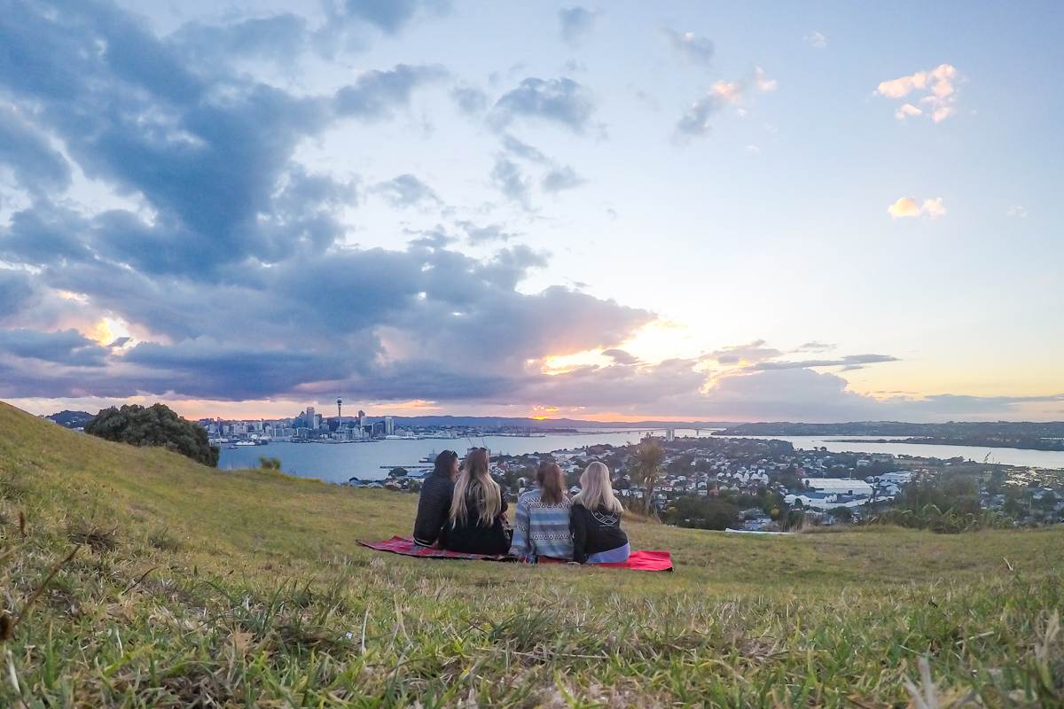 Girls sitting having picnic at Mount Victoria Lookout