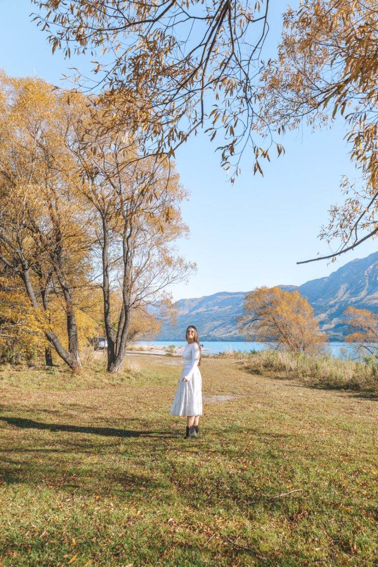 woman walking in glenorchy in autumn in the south island