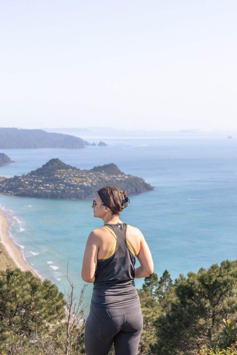 view of girl looking out over pauanui from mount pauanui summit