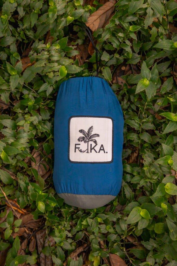 FIKA blue hammock sitting in greenery