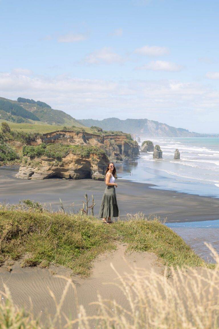 girl standing in front of three sisters and elephant rock lookout