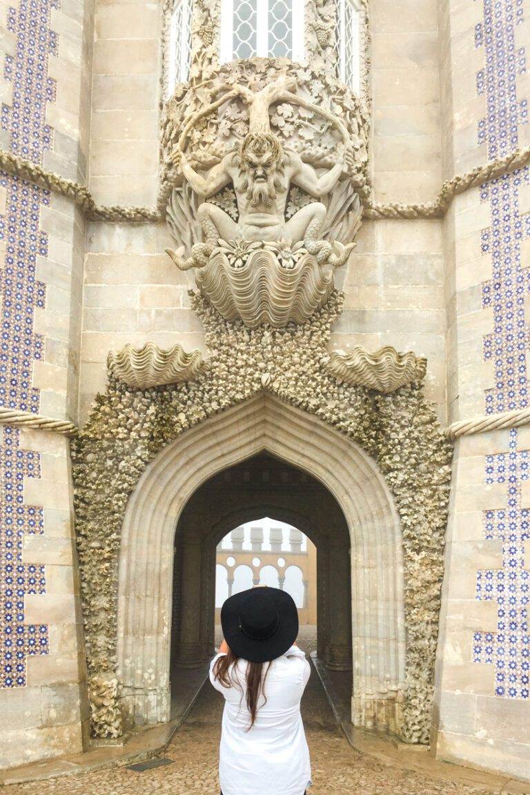 girl taking photo outside of pena palace