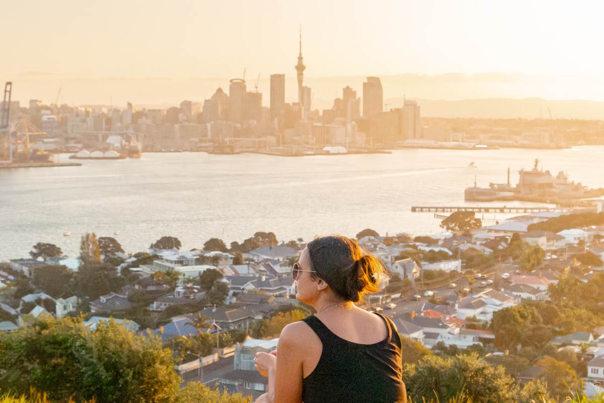 girl sitting on top of Mount Victoria Summit Lookout