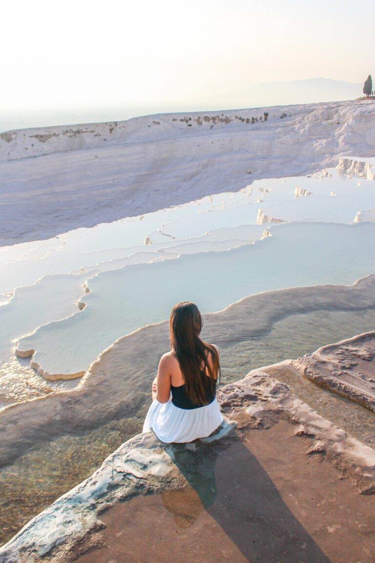 girl sitting on cotton castle terraces