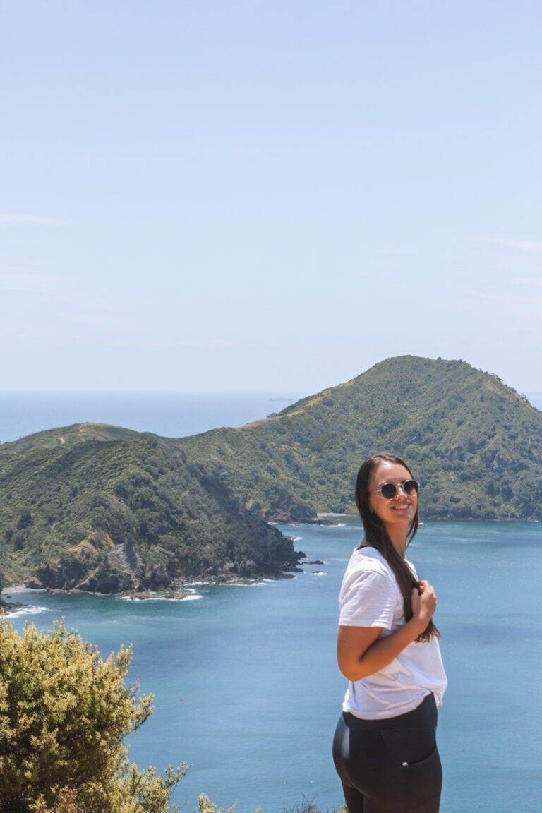 woman smiling at camera from henry hill lookout