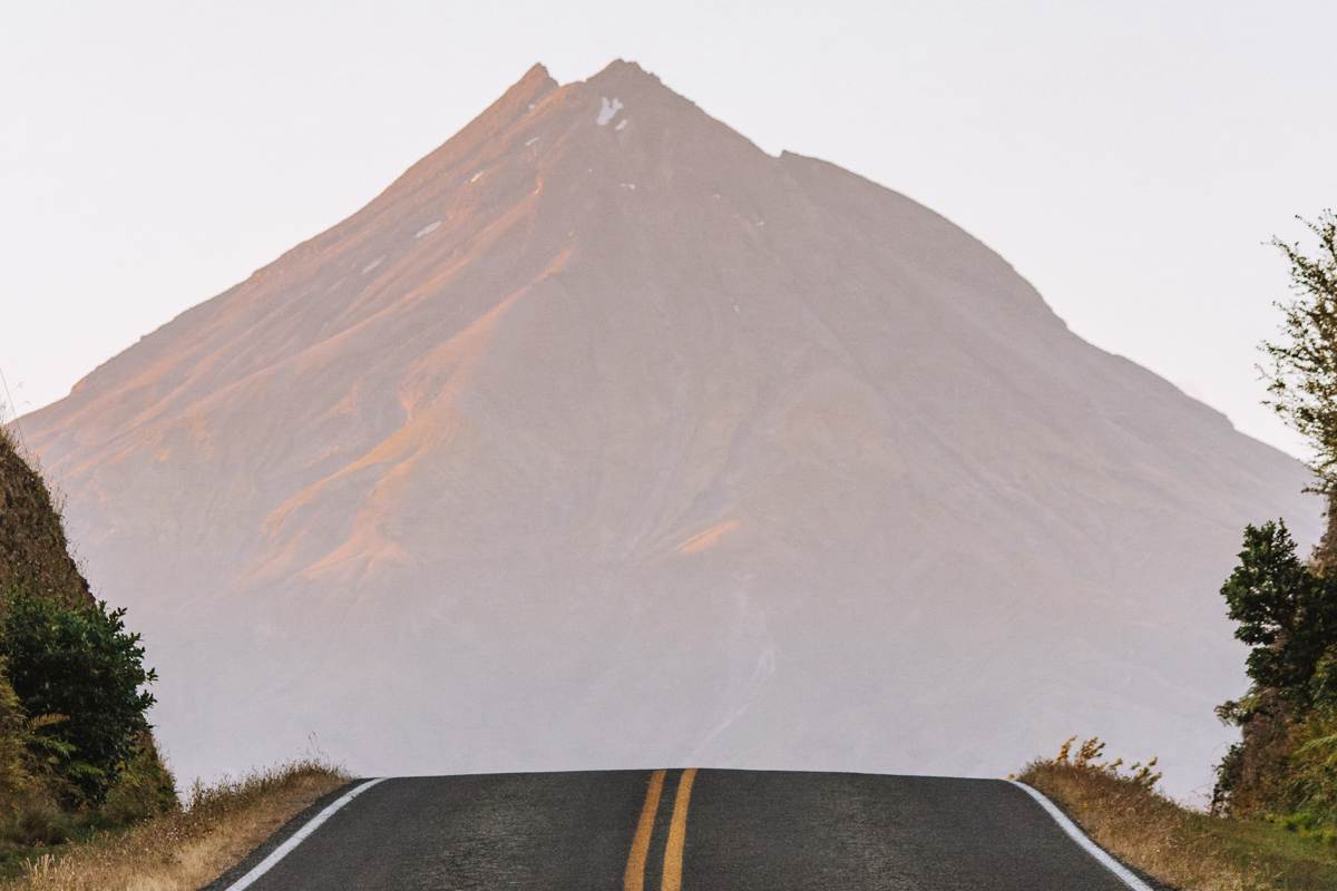 kent road in taranaki at sunrise