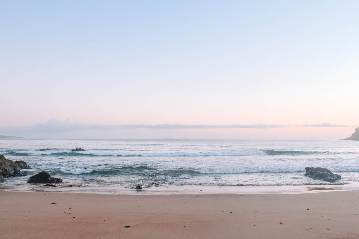 landscape of pataua south beach at sunrise