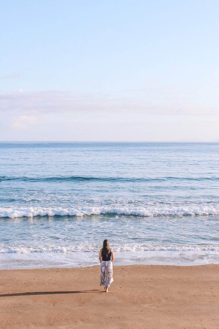 girl at pataua south beach, northland