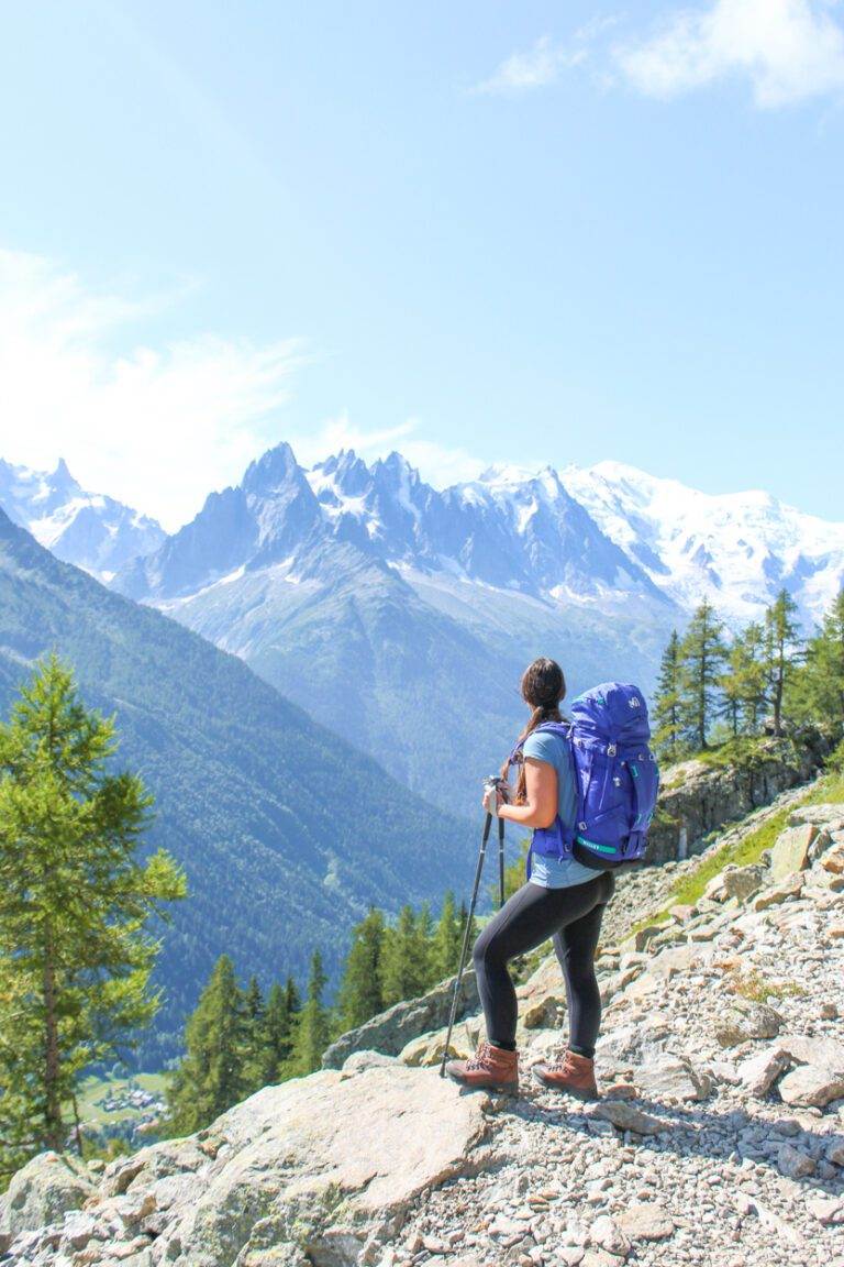 essential photography gear for hiking girl hiking chamonix with overnight pack