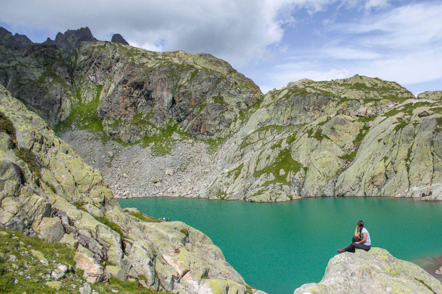 girl sitting on mountain at lac blanc