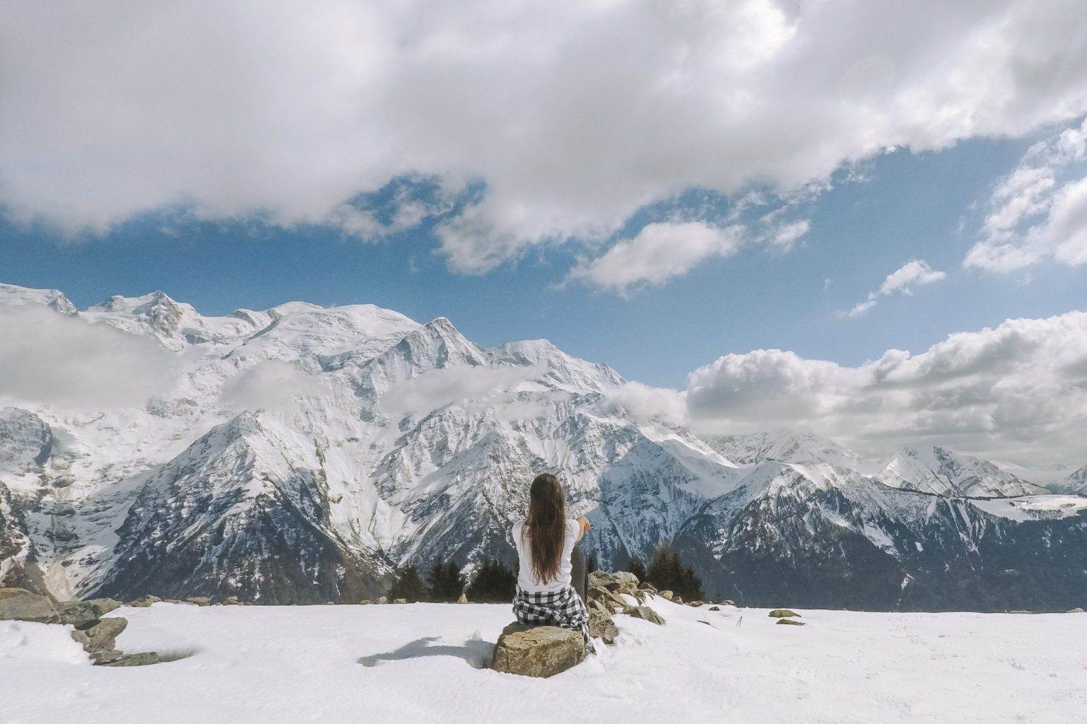 girl sitting on rock at alpages de chailloux