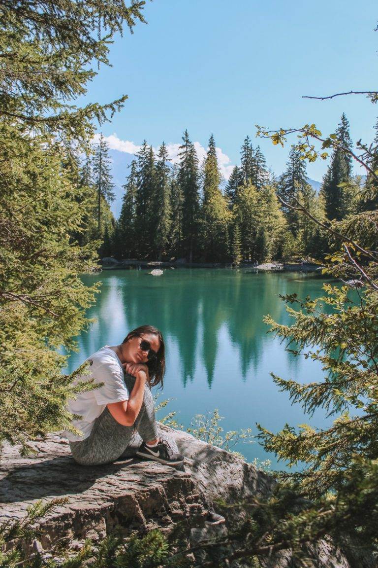 girl sitting next to lac vert