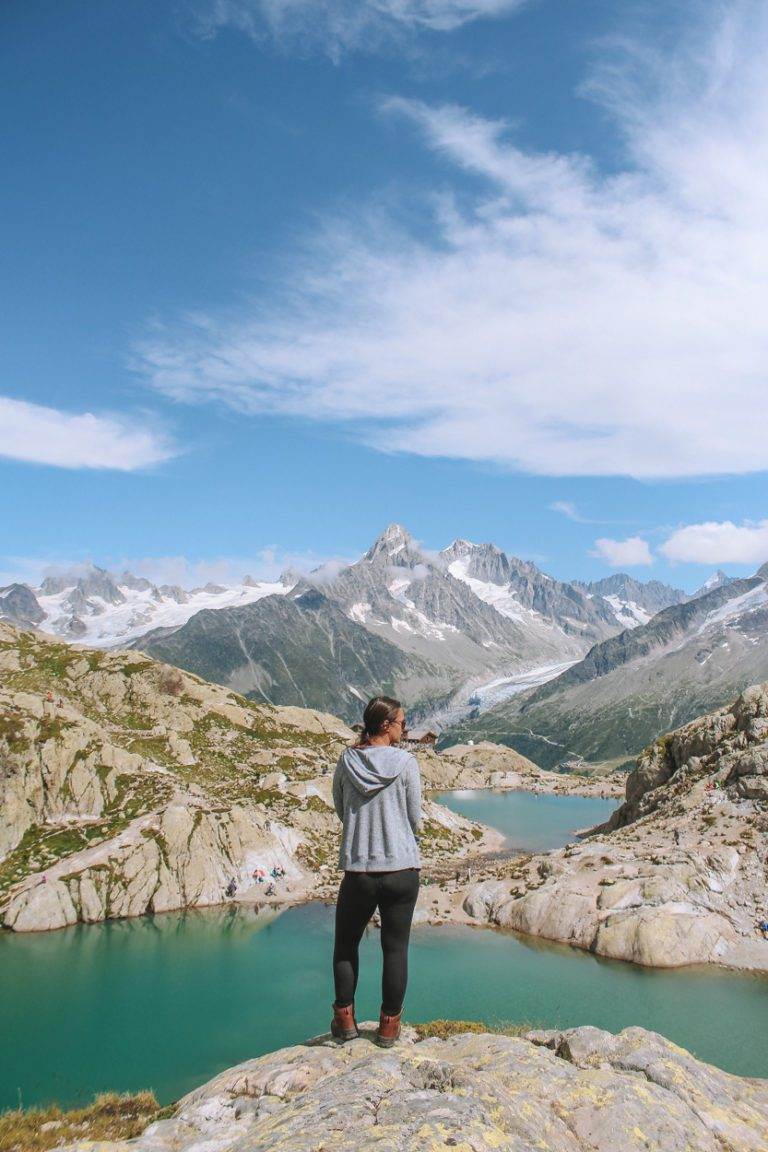 girl standing in front of lac blanc after hiking chamonix