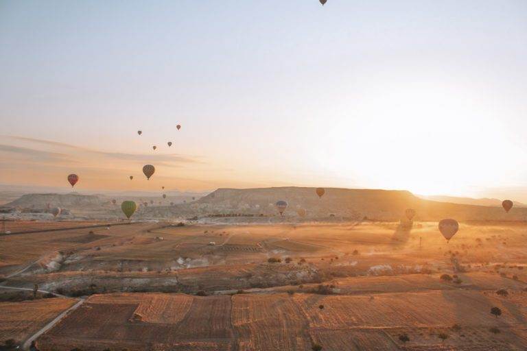 hot air balloons in cappadocia at sunrise