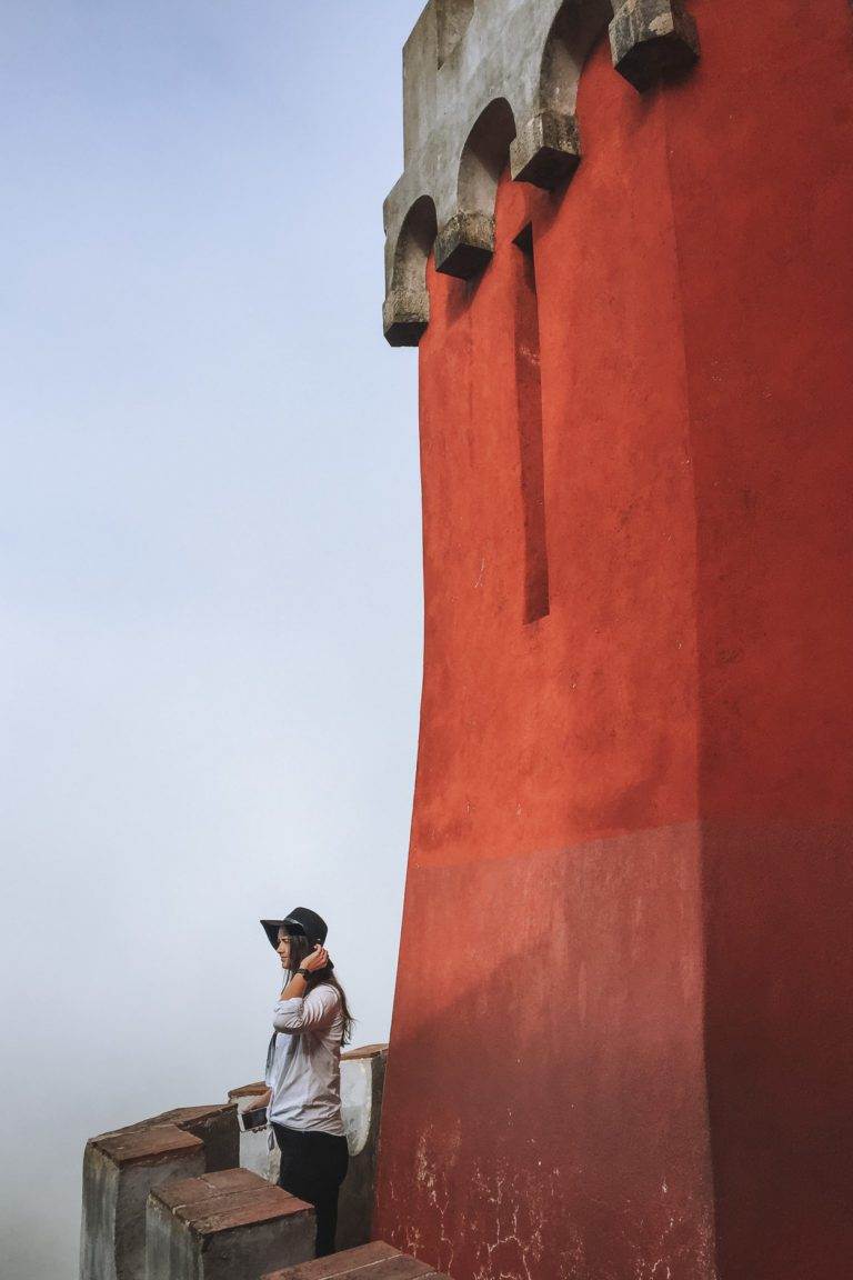 girl standing in pena palace exterior walkway